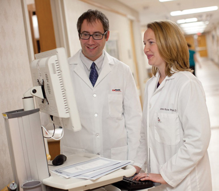 Researchers such as Philip Trapskin, PharmD/BCPS, and Anne Rose, PharmD, from the UW Health Anticoagulation Stewardship Program (ASP) provide the highest level of care and the best possible outcomes for patients on antithrombotic medications such as warfarin, for which the therapeutic window is unique to each individual. Photo credit: UW Health. 