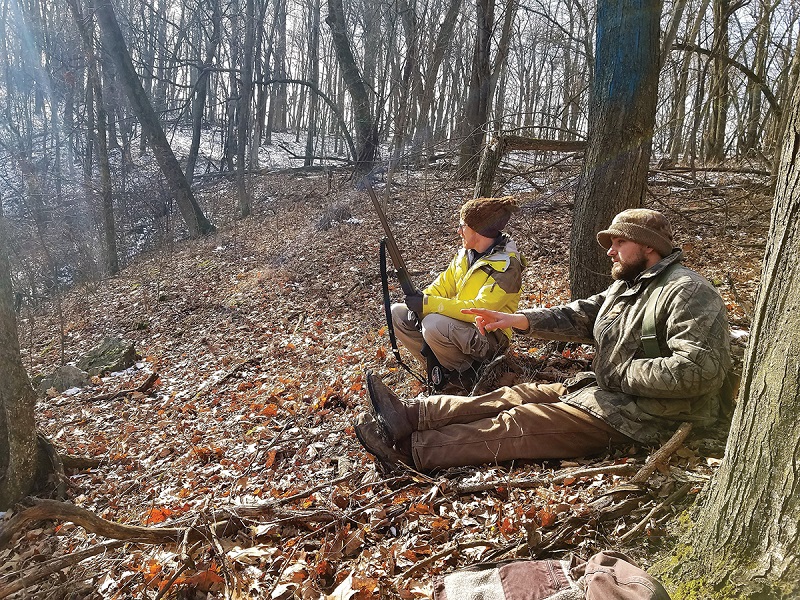 A quiet moment during a mentored squirrel hunt in Sauk County. Photo by Emily Lehl A quiet moment during a mentored squirrel hunt in Sauk County.
