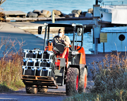 Justin Maki brings up a load of lake herring from Duffy's Dock. Photo courtesy of Red Cliff Band of Lake Superior Chippewa.